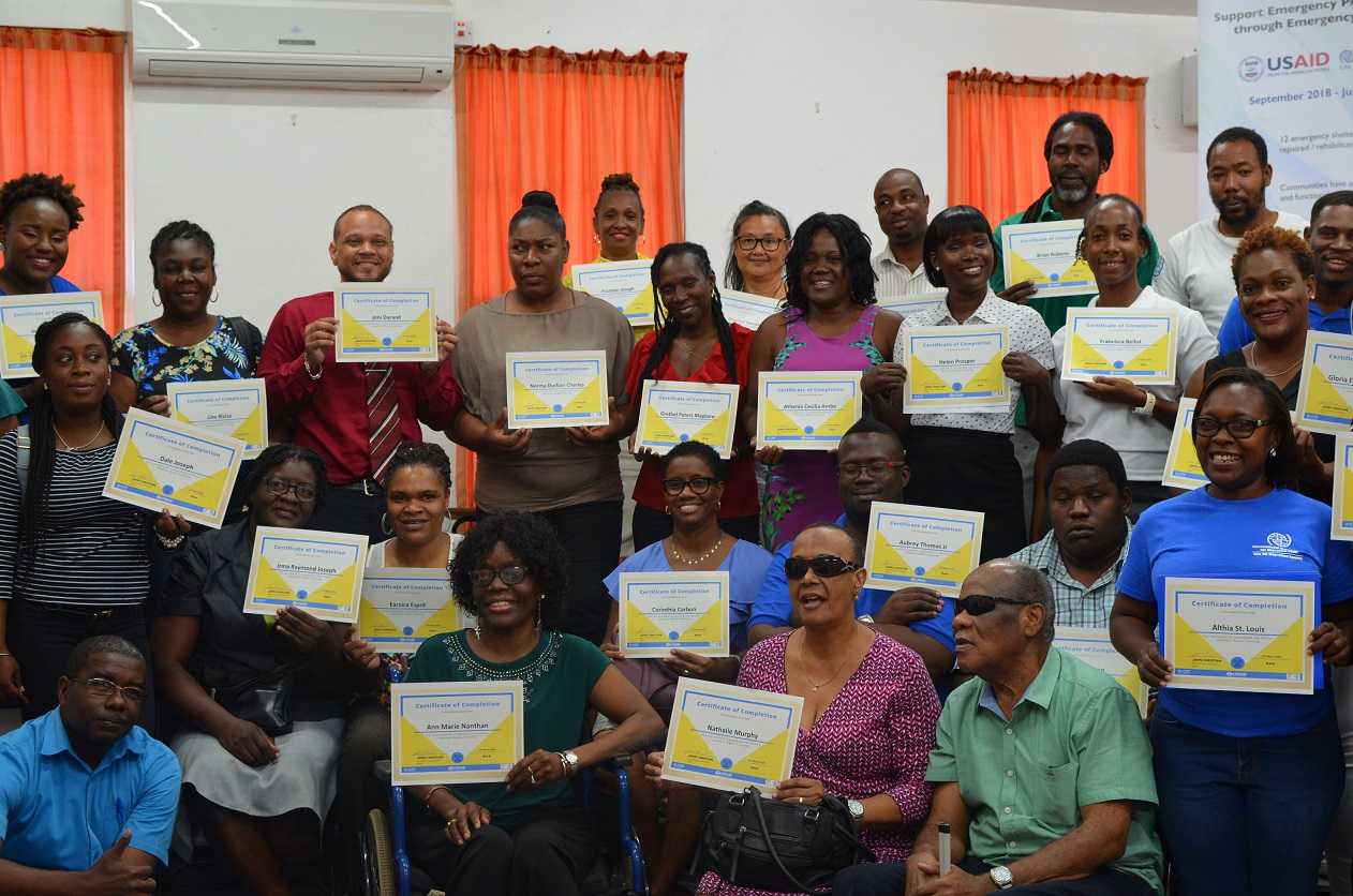 IOM Participants with Trainer John Christian after Closing Ceremony