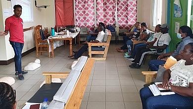 Castle Bruce Heath Team in Training by Red Cross Official