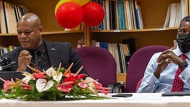 Minister Cozier Frederick with Minister for Planning, Vince Henderson