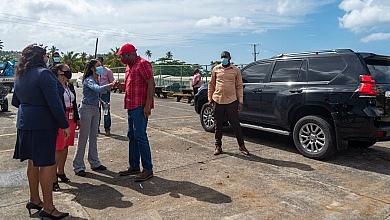Hon. Roosevelt Skerrit with Clear Harbor Staff