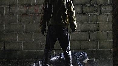Standing over Murdered