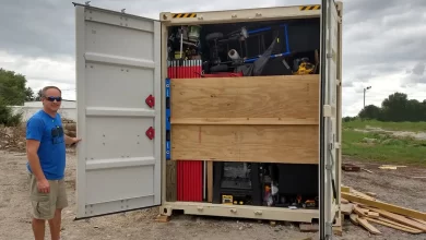 Jason Grogg Standing with Container