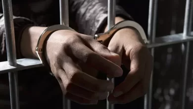 Man Behind Bars