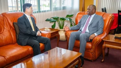 Chu Maoming with Roosevelt Skerrit