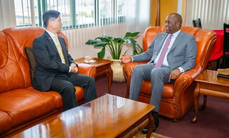 Chu Maoming with Roosevelt Skerrit