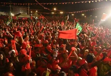 DLP Political Rally with everyone wearing Red clothing