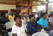 Shareholders attentively participating in DOMLEC's Annual Shareholders Forum held in Dominica
