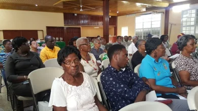 Shareholders attentively participating in DOMLEC's Annual Shareholders Forum held in Dominica