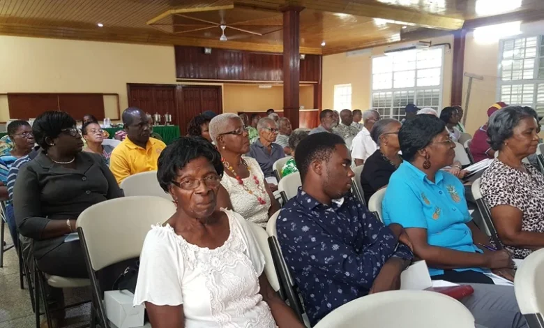 Shareholders attentively participating in DOMLEC's Annual Shareholders Forum held in Dominica