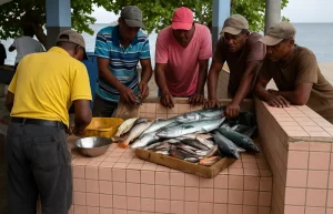 Fishermen in Dominica sorting fresh fish at a seaside Facility