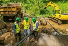 Working on DOWASCO Water System River