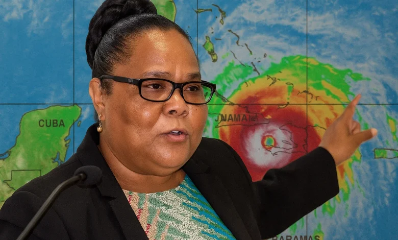 Replica of Octavia Afred Standing in Front and Pointing to Hurricane Melissa heading to Jamaica and Cuba