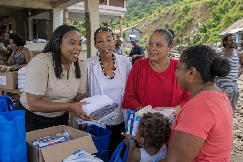 Susan Lecointe Dorsett, Chief Anette Sanford, and Councillor Francilla Darroux coordinate relief supplies for Kalinago families affected by flooding and landslides in Dominica.