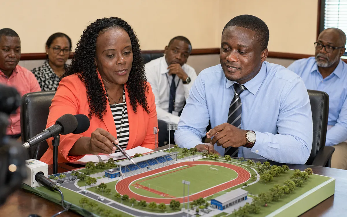 Gretta Roberts and Oscar George Review Point Round Athletics Facility Model