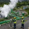DGDC technicians monitor controlled steam discharge from the Separation Area of the Roseau Valley Geothermal Plant in Laudat.